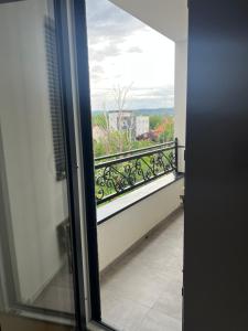 a view from a window of a balcony at Apartman 15 in Novi Sad