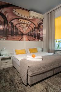 Кровать или кровати в номере Апарт-отель Наумов Лубянка