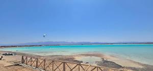 a view of a beach with blue water at Nada house in Dahab