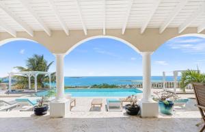 a view of the pool at a resort at villa coralia - panoramic view in Saint Martin