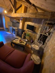 an overhead view of a living room with a couch at L'écrin de Najatte in Bourg-sur-Gironde +12 photos