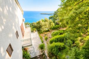 an apartment with a view of the ocean at SunSeoce Apartments in Budva