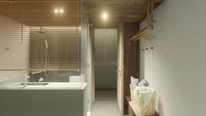 a kitchen with a sink and a counter top at Rucha Beachfront Retreat in Ấp An Lộc A +11 photos