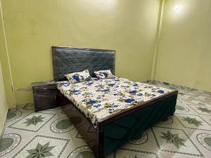 a bedroom with a bed in a room at 2BHK Ground Floor Private House- Raj Shila in Kānpur