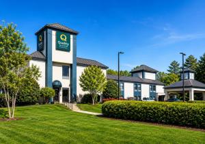 a building with a sign on the side of it at Quality Inn & Suites Clemmons I-40 in Clemmons