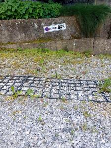 a street sign sitting on the side of a sidewalk at Viktoria's B&B in Unterkulm