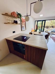 a kitchen with a sink and a counter top at Moje sPokoje in Morgowniki