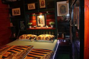 a bedroom with two beds in a room at Frenkcottage 5 KM FROM THE AIRPORT- FREE TRANSPORTATION TO THE AIRPORT in Šenčur +44 photos
