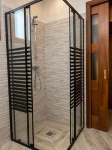 a shower with a glass enclosure in a bathroom at Cà d'Margherita and Heidi in Valdieri +131 photos