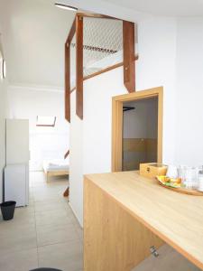 a kitchen with a wooden counter top in a room at Villa Slnava in Banka