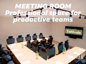 a conference room with a meeting room professional space for productive teams at B&B Tonivale - Heated Pool, Padel & Meeting Room in Skrbčići +45 photos