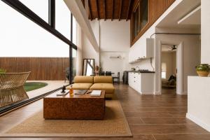a living room with a couch and a table at Voger Sapanca Lake View in Sapanca