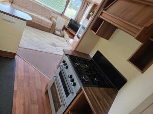 an overhead view of a kitchen with a stove at High View in Freystrop