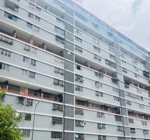 an apartment building with balconies on the side of it at Bloque 9y10 in Caracas
