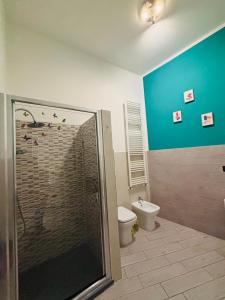 a bathroom with a shower and a toilet at Il filo di Claudia in Savona