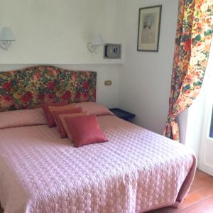 Postel nebo postele na pokoji v ubytování B&B Le Palme