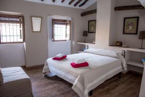 Ein Bett oder Betten in einem Zimmer der Unterkunft Casa Rural Zambra
