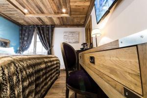Postel nebo postele na pokoji v ubytování Le Chalet Blanc