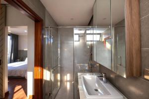 a bathroom with a sink and a shower at La Lapine Villa -6rooms-15Pax in Khu Chi Lăng +30 photos