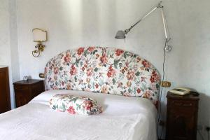 Postel nebo postele na pokoji v ubytování B&B Le Palme