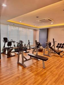 a gym with several exercise bikes and exercise balls at Casa Primo in Biñan