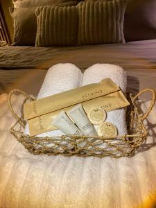 a basket of towels and towels on a bed at Casa Primo in Biñan +34 photos