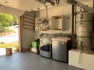 a kitchen with a stove and a sink at Spacious 3 bedrooms 1 bath Jacuzzi BBQ SINGLE HOUSE in Agoura Hills