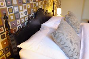 Letto o letti in una camera di B&B Sint Pieter
