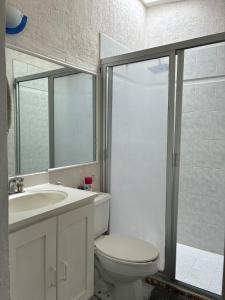 a bathroom with a toilet and a sink and a shower at House check-in anytime after 3 pm in Jurica +72 photos