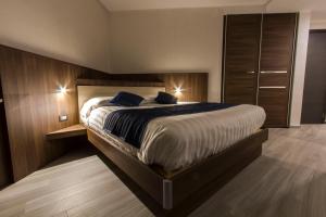 Voodi või voodid majutusasutuse Mito Hotel toas