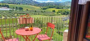 a table and chairs on a balcony with a view at Bed & Breakfast Valeri in Artena