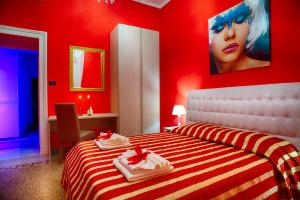A bed or beds in a room at Guest House Biondi