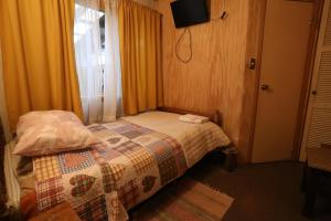 Postelja oz. postelje v sobi nastanitve Casa Chilhué - Hostal Residencial