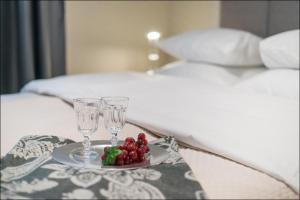 Łóżko lub łóżka w pokoju w obiekcie P&O Apartments Zgoda