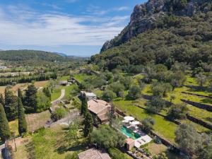 an aerial view of the property with a mountain in the background at Finca Es Coste by Rentallorca in Pollença