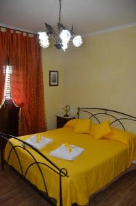 A bed or beds in a room at Casa Magini