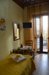 A bed or beds in a room at Casa Magini