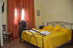 A bed or beds in a room at Casa Magini