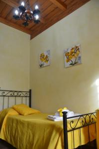 A bed or beds in a room at Casa Magini