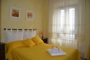 A bed or beds in a room at Casa Magini