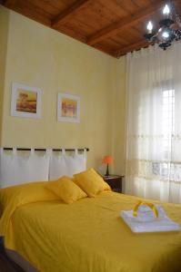 A bed or beds in a room at Casa Magini