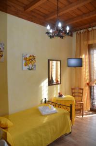 A bed or beds in a room at Casa Magini