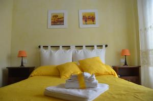 A bed or beds in a room at Casa Magini