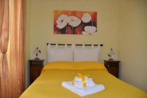 A bed or beds in a room at Casa Magini