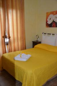A bed or beds in a room at Casa Magini