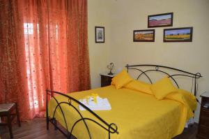 A bed or beds in a room at Casa Magini