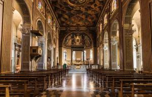a large church with a lot of pews at Casa Patrizia in Velletri