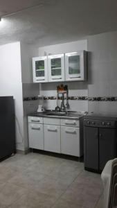 مطبخ أو مطبخ صغير في Apartamento Rodadero
