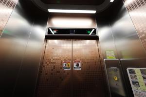 an elevator in a subway train with signs on it at Samcheok eastocean in Samcheok +6 photos