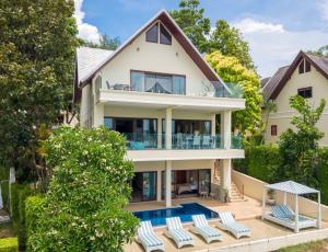an image of a house with a swimming pool at Oceans Eleven Villa Samui - Oceanfront, Private Pool, Perfect for families and friends in Bangrak Beach